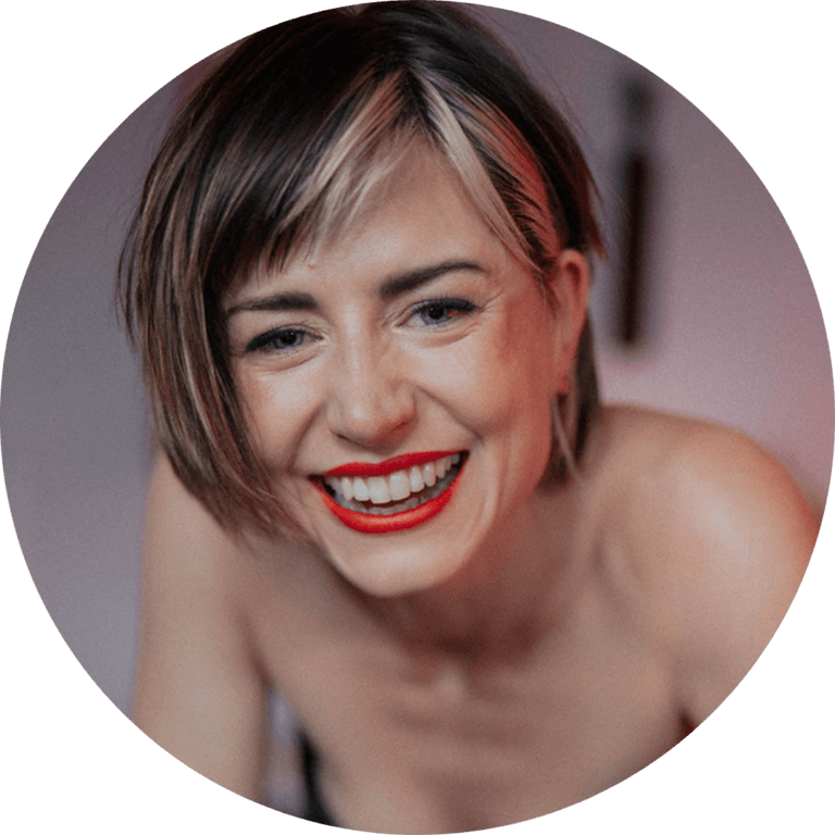 Happy woman with short hair and red lipstick smiling